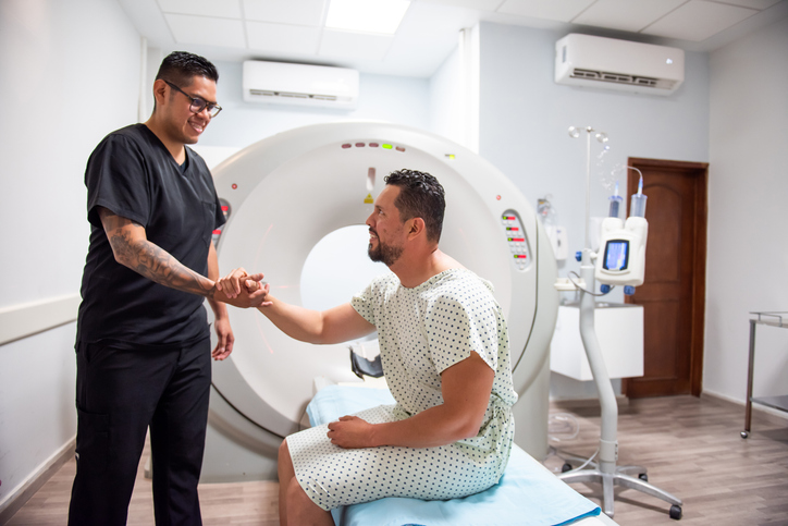 Image of doctor with patient on mri table