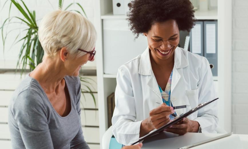 Patient talking to a doctor about cancer diagnosis and exercise 