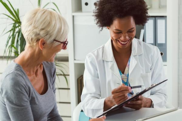 Patient talking to a doctor about cancer diagnosis and exercise 