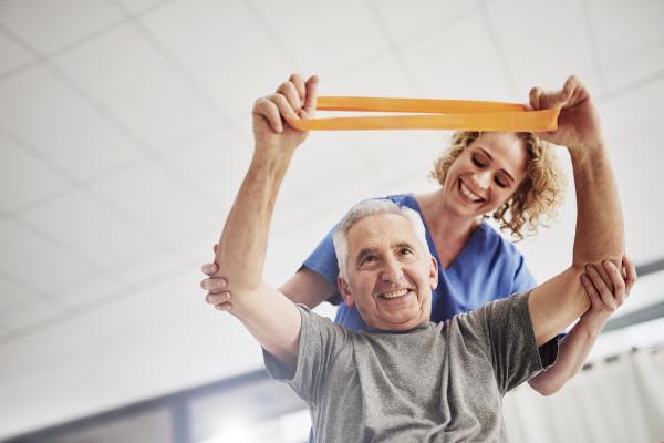 patient working out with doctor