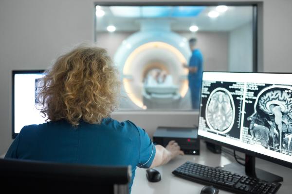 doctor observing brain scan