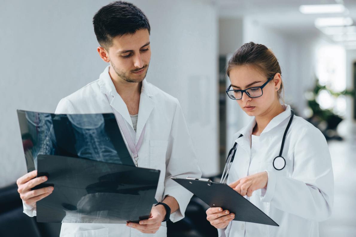 Group of medical students practicing at clinic stock photo