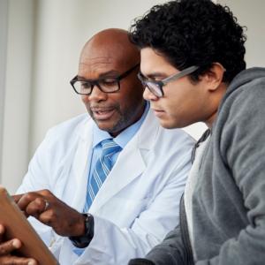 Patient talking to doctor about brain tumor