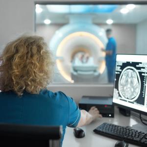 doctor observing brain scan
