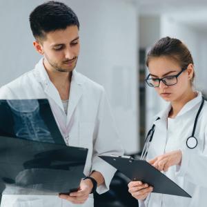 Group of medical students practicing at clinic stock photo